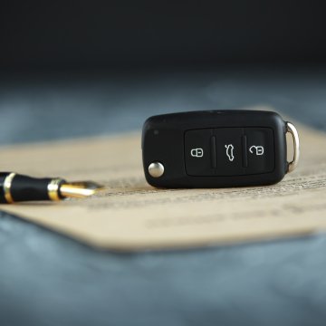 bumper to bumper warranty service car warranty car key pen on paper contract